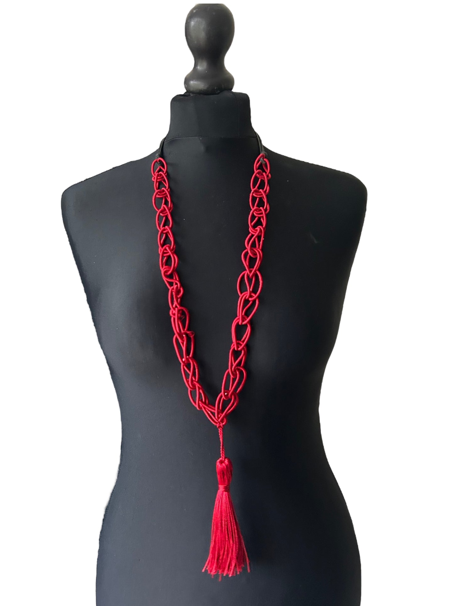 Artisanal red and tassel long necklace